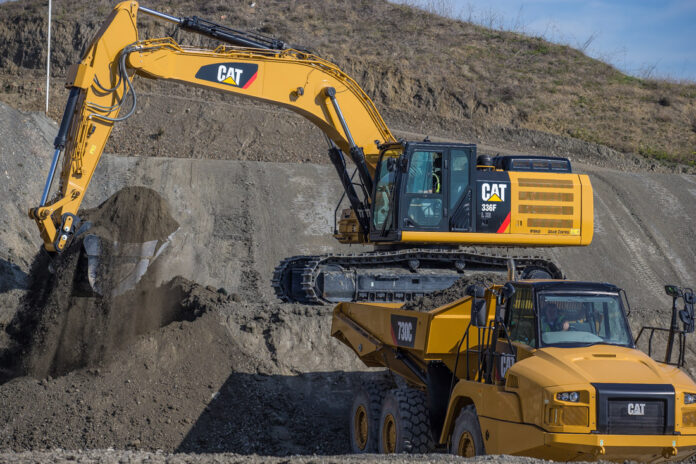 Cat 336F XE laster en Cat 730C dumper|Daniel Carro