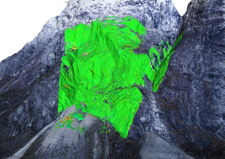 Dette bildet fra den skredutsatte E16-strekningen er laget ved å kombinere data fra radarmålinger med foto fra drone. Gult og rødt markerer hotspots der det er opp mot 4 millimeter forflytninger (rødt) i løpet av ett år. (Foto: NGI)